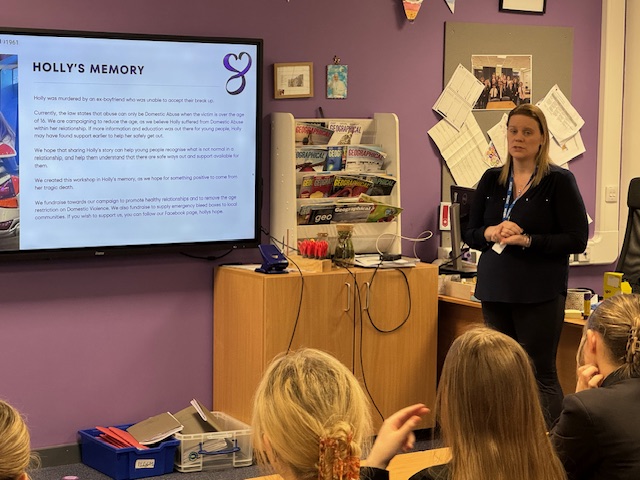 Micala delivering Holly's Hope relationship education workshop to students in a school classroom